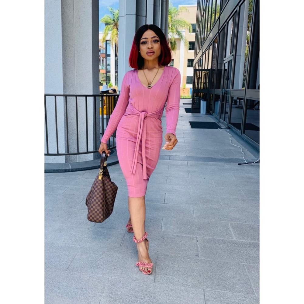LONG SLEEVE MIDI DRESS.